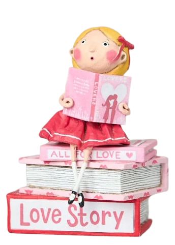 Hand-painted “Love Story” figurine by Lori Mitchell—sweet girl in pink and red dress perched atop a stack of romance books, lost in a love story