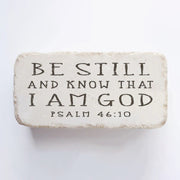 Psalm 46:10 scripture stone, rustic cast-stone décor block engraved with “Be still and know that I am God,” Christian home accent